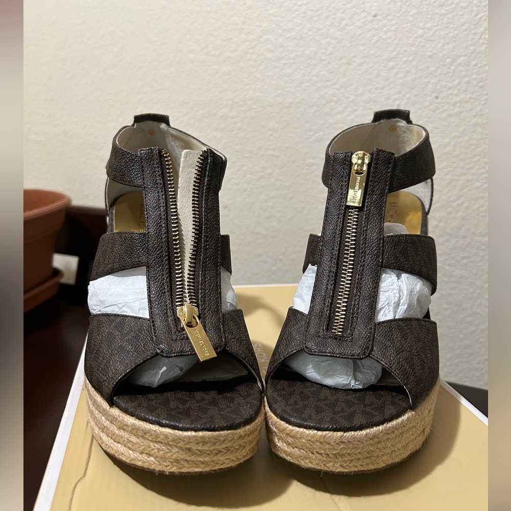 Authentic Kors wedges size 9.5